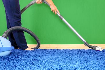 Cleaning a Carpet with a vacuum